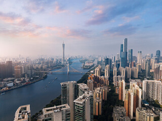 Obraz premium Aerial view sunrise of Guangzhou China skyline at dusk with Guangdong tower and pearl river