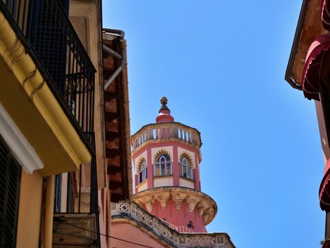 Pink Neo-Mud&eacute;jar Tower Against Clear Blue Sky in Palma Historic Center