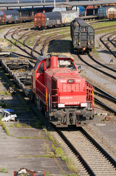 SBB red diesel freight locomotive Am 843 moving in railway marshalling yard in Chiasso, Switzerland