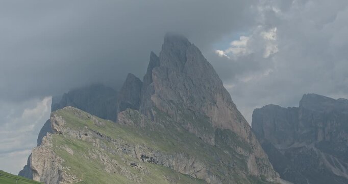 Dramatic seceda ridgeline view with moving clouds