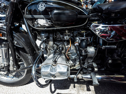TAVERNES BLANQUES, SPAIN - JUNE 14, 2026.Close up view of the engine and fuel tank of a black Ural boxer engine motorcycle on display at a local event