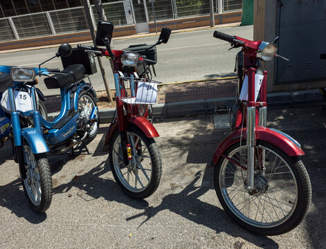 TAVERNES BLANQUES, SPAIN - JUNE 14, 2026.Classic Motovespa Vespino mopeds parked at outdoor vehicle meetup in Spain