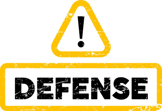A black and yellow rubber stamp design featuring the word defense inside a rectangular frame with warning icon