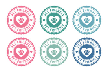 Obraz premium Pet Friendly Badge Labels Featuring Colorful Round Designs with Paw Print and Heart Symbols for Animal Care and Veterinary Services