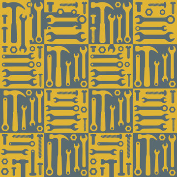 Seamless pattern of construction tools hammers wrenches and bolts in yellow