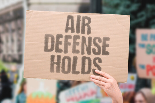 "Air Defense Holds" The protective shield remained effective against the attack. DEFENSE. AIR. DEFENSE. HOLDS. PROTECT.