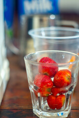 fresh strawberry in a clear glass and healthy with full nutrition of organic in a table of kitchen bar  © Mr. Frost