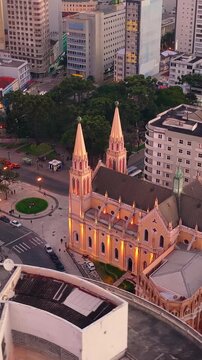 A warm sunset glow over the skyline of Curitiba Parana Brazil, Parana, Brazil