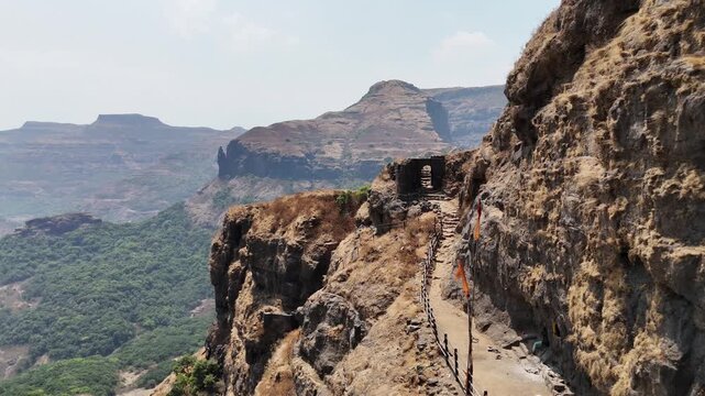 Ratangad fort cave and trail on the cliff edge Maharashtra India