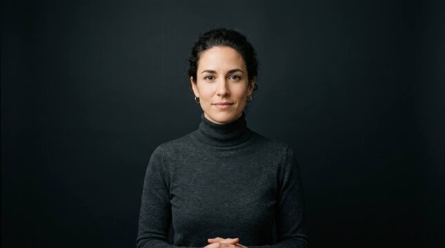 Portrait of a composed woman in a dark turtleneck looking at the camera S1 854