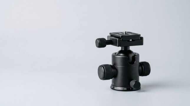 Professional Black Ball Head Mount for Photography Tripod Isolated on Grey Background