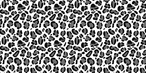 Edgy black and white leopard animal spot pattern landscape layout. Modern monochrome cheetah-skin texture for urban streetwear fabric and banner prints. © MDC