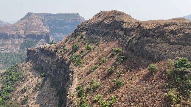 Ratangad cliffs and plateau aerial reveal in the Sahyadri Maharashtra India