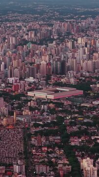 Curitiba Parana city skyline under a glowing evening sunset, Parana, Brazil