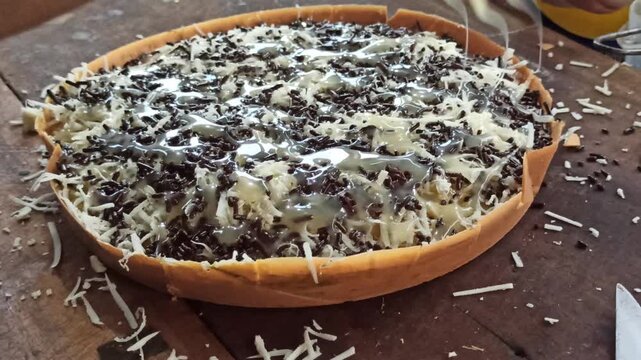 A delicious Indonesian sweet martabak freshly prepared with a soft texture and rich filling, showcasing one of the most popular traditional street food desserts in Indonesia.