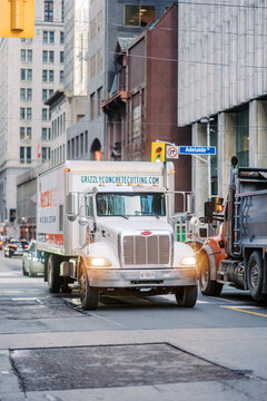 Toronto, Canada - June 20, 2026: Concrete cutting truck at downtown city intersection near Adelaide Street