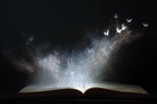 Open book with shimmering words and birds rising from the pages for magical storytelling background and literary poster design