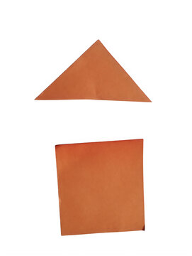 Orange paper triangle and square shapes arranged as a simple house icon isolated on transparent background