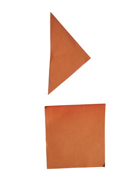 Orange paper triangle and square shapes cut out from construction paper isolated on transparent background