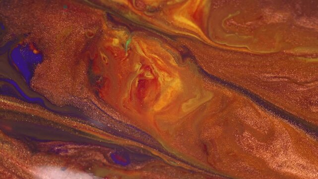 Abstract macro footage of liquid paint swirl in slow motion
