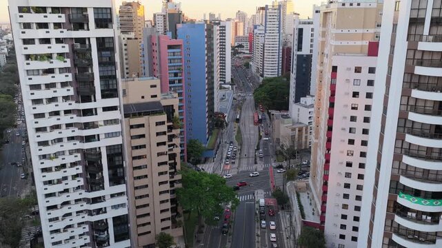Glowing sunset over the high rise buildings in Curitiba Parana, Parana, Brazil
