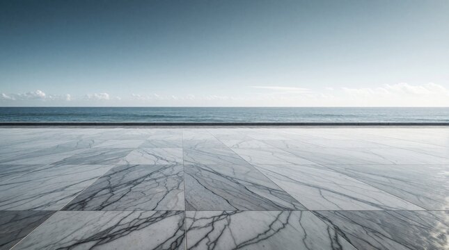 Expansive marble patio beside ocean under clear blue sky with calm sea horizon. Clean, modern outdoor space for product display or event backdrop.