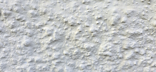 Fototapeta premium White stucco wall texture creating unique background pattern