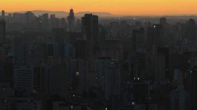 Twilight glow illuminating the skyline of Curitiba Parana, Parana, Brazil