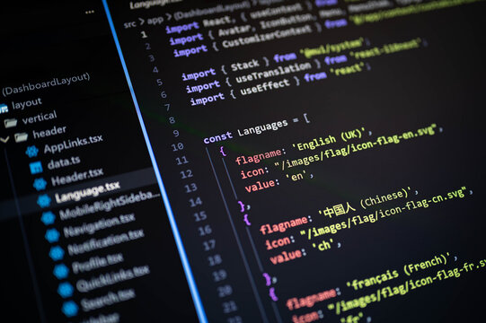 Close-up of source code in a code editor with multilingual configuration, representing software development, programming, localization, web application, coding workflow, and modern digital technology.