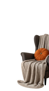 Brown chair with throw blanket.