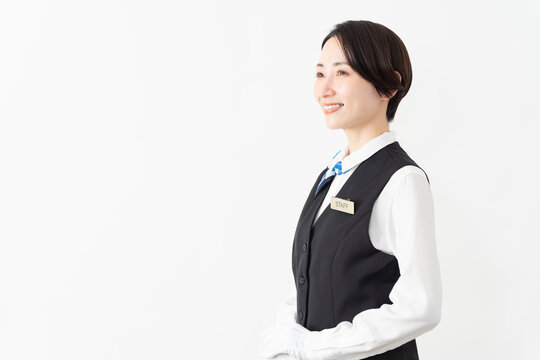 制服を着たアテンダントの女性　旅行イメージ