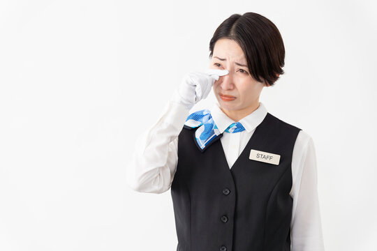 制服を着たアテンダントの女性　旅行イメージ