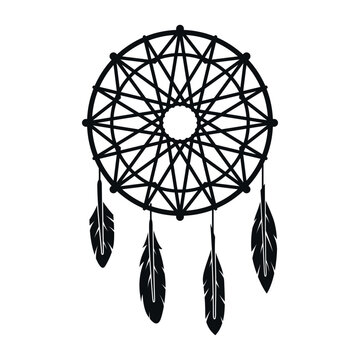 A round dreamcatcher badge with a web-like pattern and feathers at the bottom, used as decoration or a religious symbol.