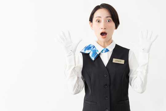 制服を着たアテンダントの女性　旅行イメージ