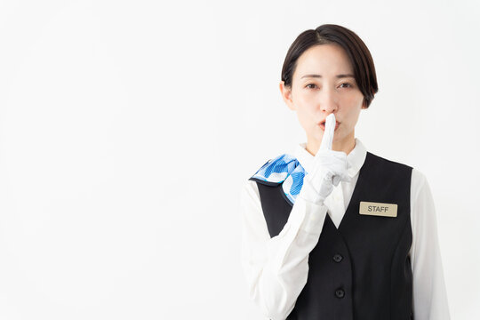 制服を着たアテンダントの女性　旅行イメージ