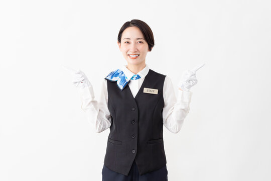 制服を着たアテンダントの女性　旅行イメージ