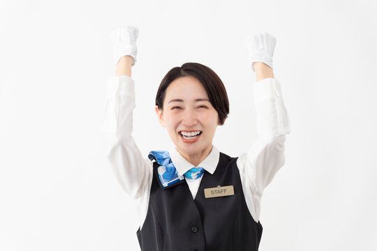 制服を着たアテンダントの女性　旅行イメージ