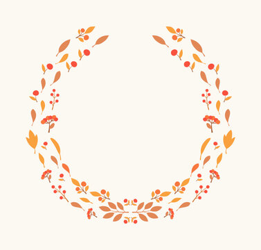 Elegant circular frame or wreath composed of various autumn leaves and berries, can be used as natural decorative border for greeting cards or invitations