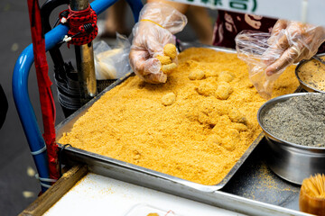 Fototapeta premium the authentic preparation of Handmade Peanut Mochi