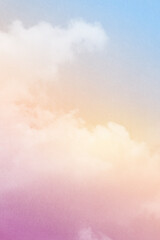 Obraz premium fantasy blurred cloudy sky with blue, orange and purple gradient color with grunge paper texture when zoom 100%, vertical nature abstract background