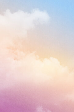 fantasy blurred cloudy sky with blue, orange and purple gradient color with grunge paper texture when zoom 100%,  vertical nature abstract background
