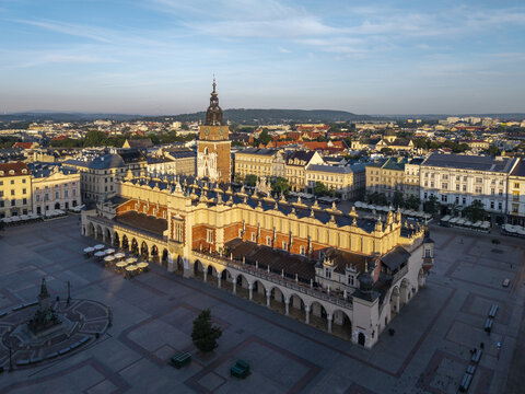 Krakow, Poland - 25 July 2026: Aerial view of the historic Cloth Hall and Town Hall Tower in the Main Market Square of Krakow Old Town, surrounded by traditional architecture.