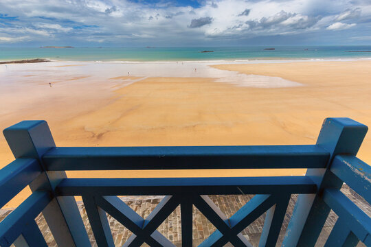 Low Tide Sandy Beach Viewed from Seaside Promenade in Saint Malo Brittany France