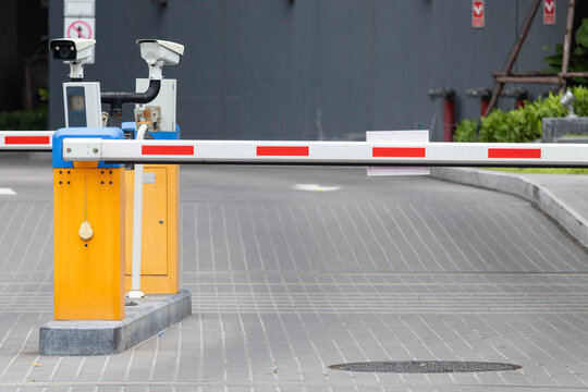 Modern access control system with surveillance cameras and safety barrier