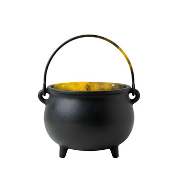 Witch's cast iron cauldron with glowing golden light on black