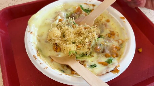 Indian Street Style Cheese Chaat With Sev Chutney And Chickpeas Served In Bowl