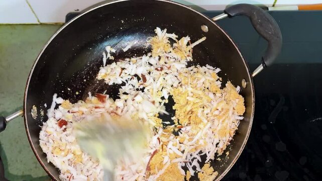 Authentic Indian Sweet Recipe Preparation With Coconut And Jaggery Mixture