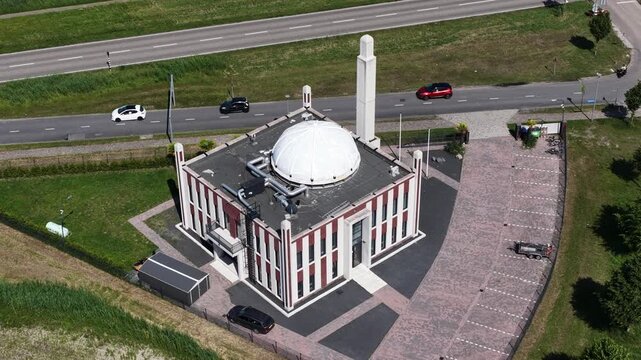 Aerial view of Baitul Afiyat Mosque in Almere, showing a religious building, Islamic architecture and community landmark in a modern residential area.
