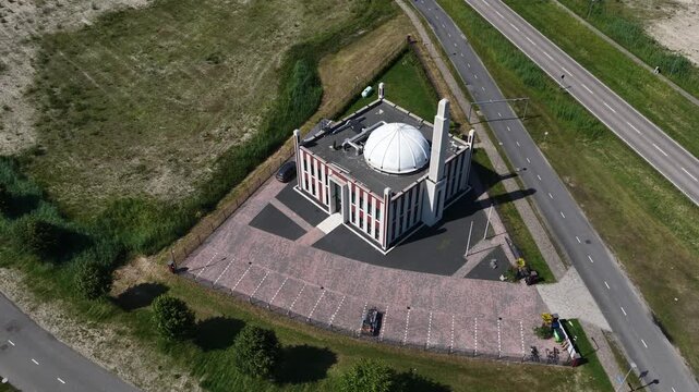 Aerial view of Baitul Afiyat Mosque in Almere, showing a religious building, Islamic architecture and community landmark in a modern residential area.