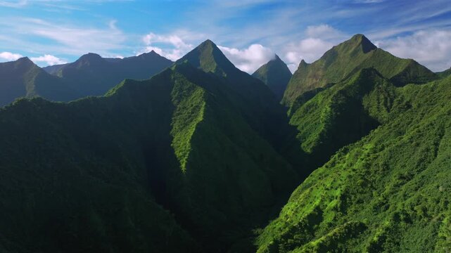 Vaiau River Valley Tahiti Ito Volcano mountains peaks of Teahupo'o South Pacific Island French Polynesia aerial drone afternoon sunny blue sky Tara Huhurahi Ridge Mount Ronui Aorai Orohena circle left